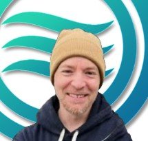 Ben Senior, founder and head technician of Ozone Climate, smiling in front of the company logo
